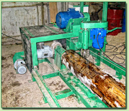 Станок для оцилиндровки бревен и производства оцилиндрованного бревна