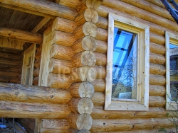 Деревянный дом из оцилиндрованного бревна